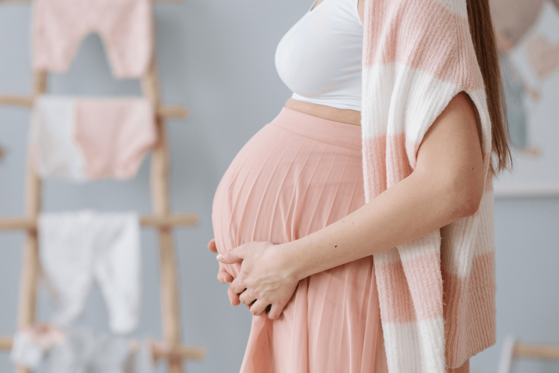Pregnant woman receiving prenatal chiropractic care at Crest Hill Clinic near Joliet, IL