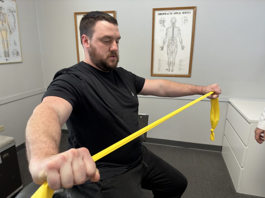 Physical therapy session with resistance bands